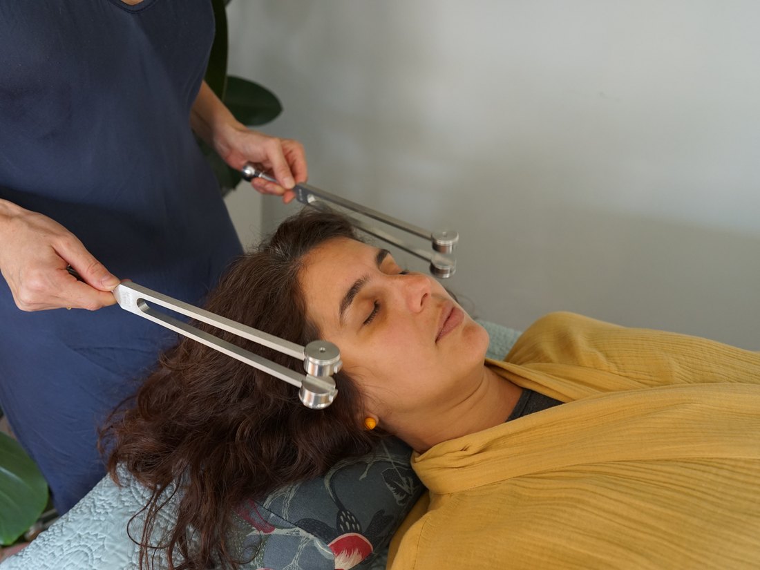 Tuning forks during a Biofield Tuning session